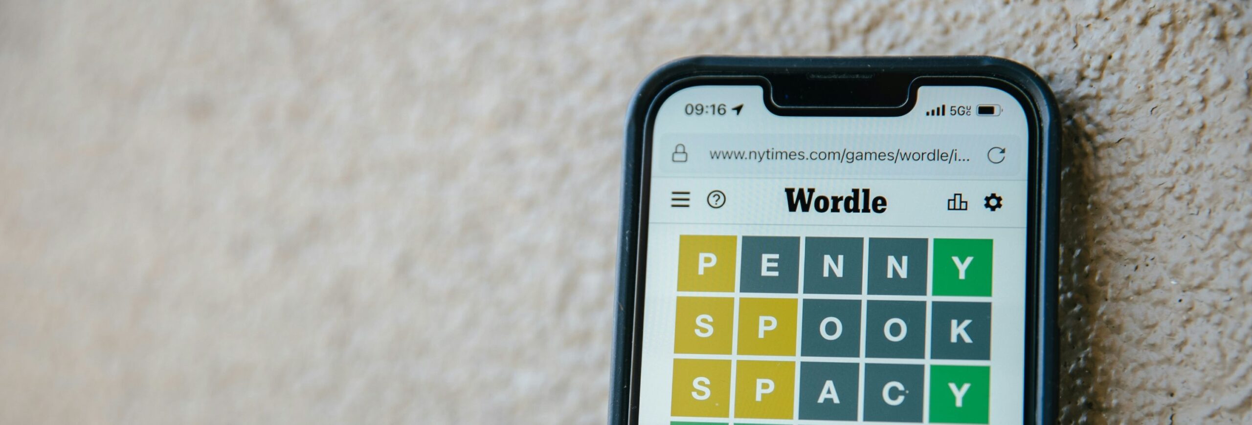 phone with wordle on it